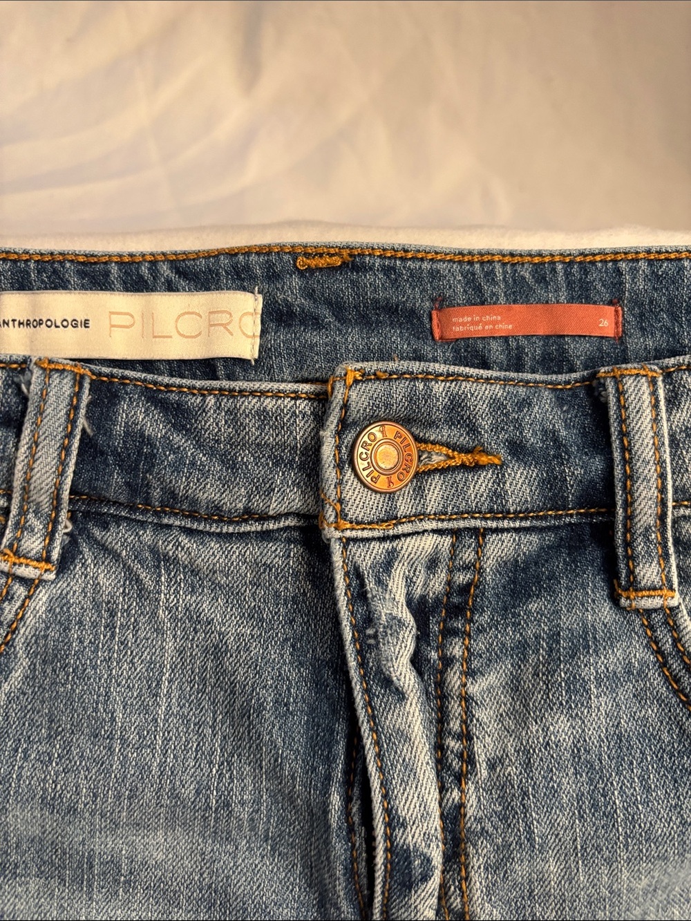 Pilcro High-Rise Blue Wash Jean Shorts, size 26, distressed